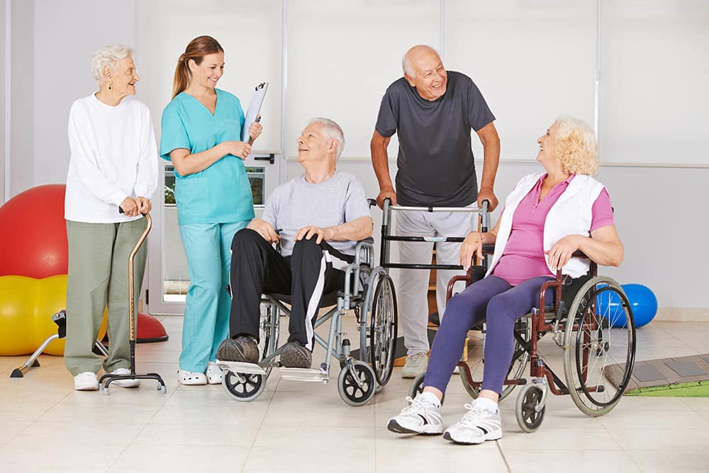 Elderly men and women with a doctor